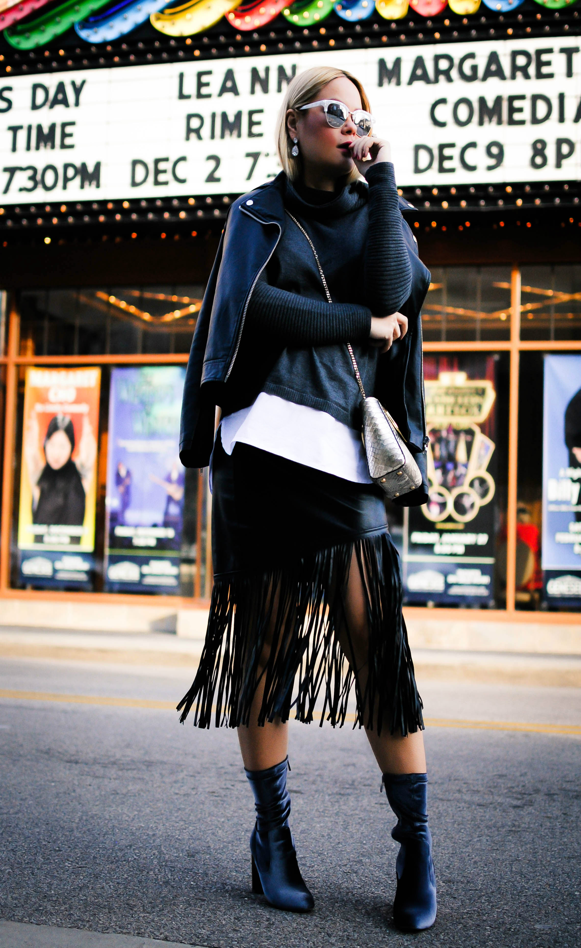 vanessa-lambert-blogger-behind-what-would-v-wear-shows-how-to-wear-fringe-during-winter-wearing-a-leather-fringe-skirt-and-velvet-booties_1