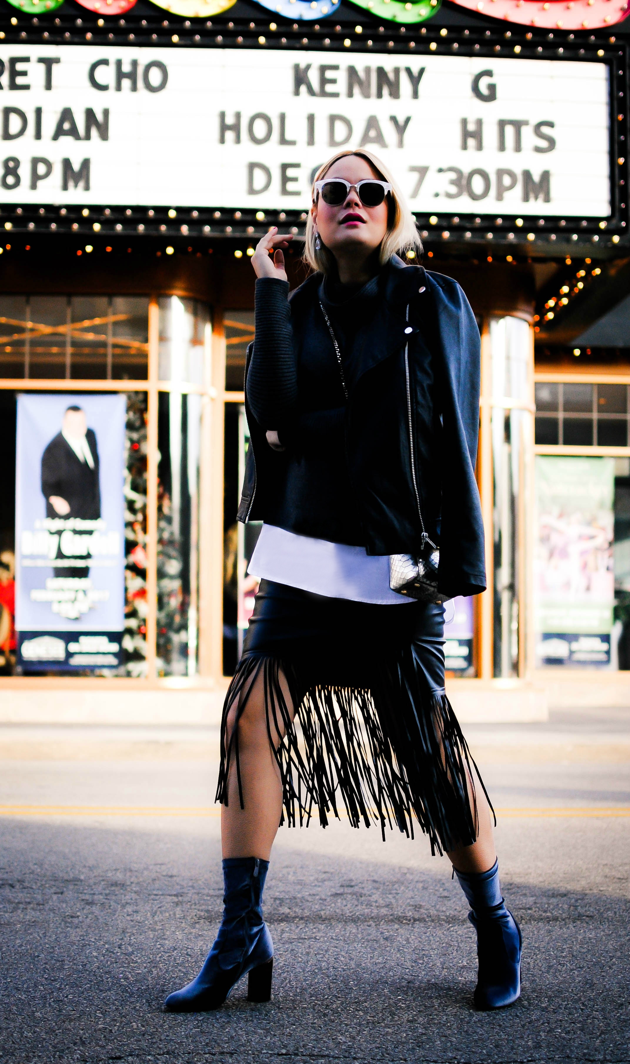vanessa-lambert-blogger-behind-what-would-v-wear-shows-how-to-wear-fringe-during-winter-wearing-a-leather-fringe-skirt-and-velvet-booties_7-2
