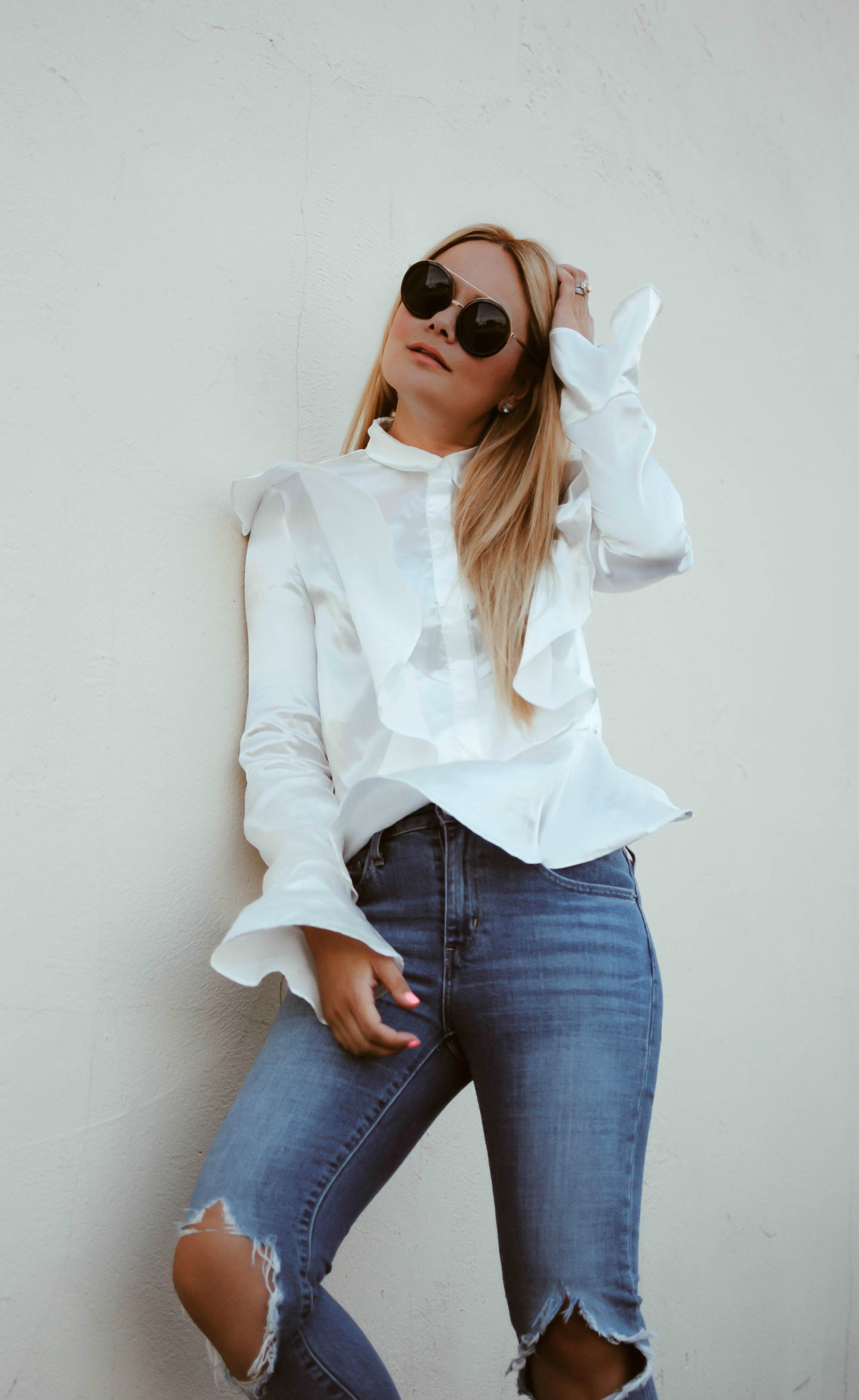 ruffle silk blouse distressed levis jeans